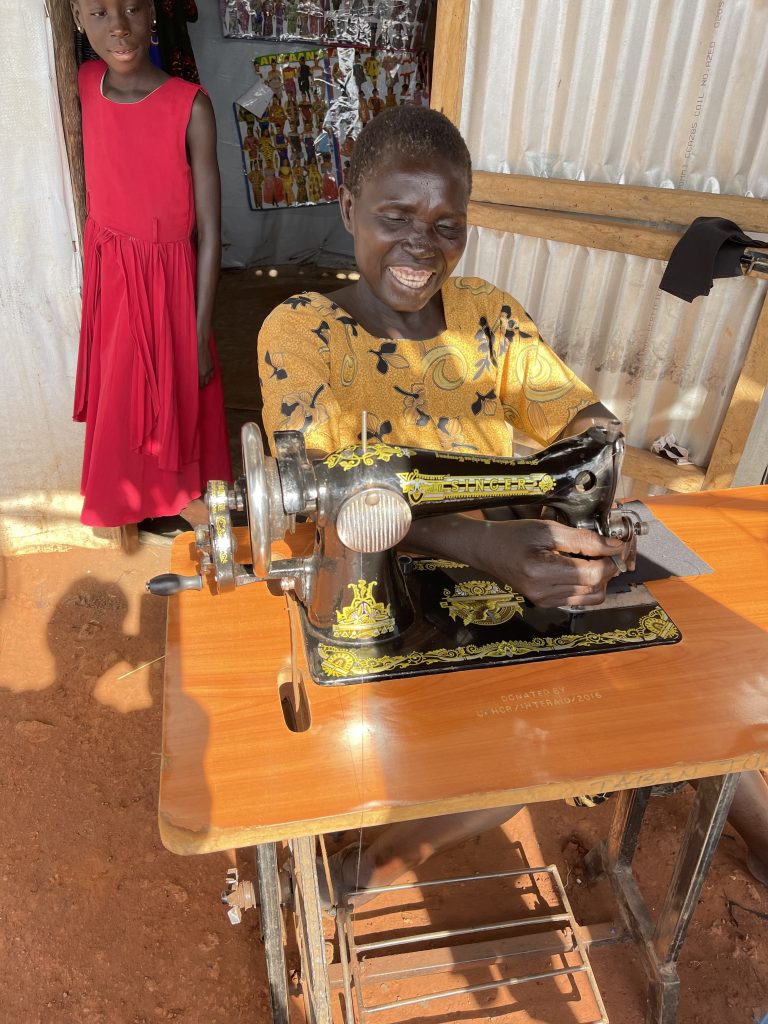 Crippled Widow Trained to Tailor and Operate a Business